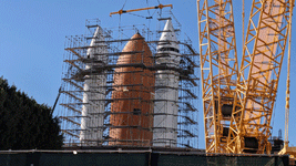 ET-94 and the twin solid rocket boosters for Endeavour stand tall at the construction site for the future Samuel Oschin Air and Space Center in Los Angeles...on January 12, 2024.