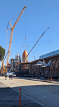 With the retired F/A-18 Hornet in the foreground, ET-94 and the twin solid rocket boosters for Endeavour stand tall at the construction site for the future Samuel Oschin Air and Space Center in Los Angeles...on January 12, 2024.