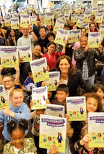 California Senator (and now U.S. Vice President) Kamala Harris takes part in a group photo during the reading and signing of her new book SUPERHEROES ARE EVERYWHERE