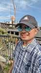 Posing with Endeavour's Space Shuttle Stack as it stands fully assembled at the construction site for the future Samuel Oschin Air and Space Center in Los Angeles...on January 30, 2024.