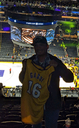 Posing with a free commemorative Pau Gasol jersey after the L.A. Lakers-Memphis Grizzlies game ended at Crypto.com Arena.