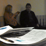 Videotaping Monica and Chris while they chat during a break at work... Yes, they knew.