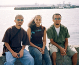 Usha, Franz and I pose with Naval Base San Diego behind us.