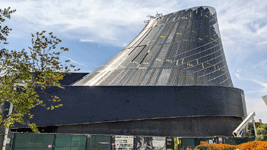 The diagrid structure now enshrouds the Shuttle Gallery at the Samuel Oschin Air and Space Center...on May 16, 2025.