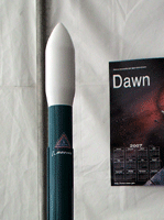 A scale model of the Delta II rocket that will launch Dawn into space.