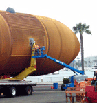 Riding on a cherry picker, engineers work on ET-94 at Fisherman's Village in Marina del Rey, on May 19, 2016.