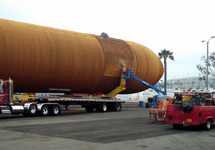 Riding on a cherry picker, engineers work on ET-94 at Fisherman's Village in Marina del Rey, on May 19, 2016.