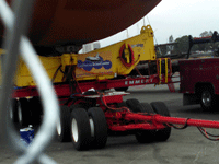 A close-up shot of the various wheels underneath ET-94's flatbed carrier, on May 19, 2016.