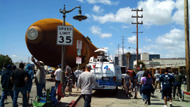 ET-94 rolls past an NBC TV news van as it continues to roll down Vermont Avenue...on May 21, 2016.