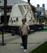 Posing in front of SpaceX's Dragon C1 capsule at E3 2013 in downtown Los Angeles.