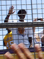 Former Laker A.C. Green waves to the crowd