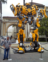 At Paramount Pictures in Hollywood, posing in front of the life-size Bumblebee prop used in the first TRANSFORMERS movie.
