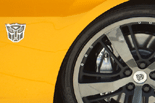 A close-up of two Autobot symbols on the Chevy Camaro.