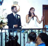 Usha makes a speech during her and Albert's wedding reception.