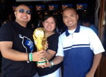 Carlo, Sarina and I pose with a World Cup trophy replica at Legends sports bar in Long Beach.