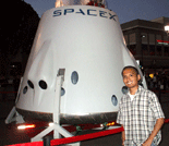 Posing in front of a full-scale mockup of SpaceX's DragonRider at Planetfest 2012 in Pasadena.