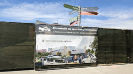 An image of the Samuel Oschin Air and Space Center adorns a fence surrounding the building's construction site...on August 9, 2022.