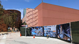 Images of the Samuel Oschin Air and Space Center adorn a fence surrounding the building's construction site...on August 9, 2022.