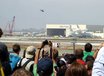 The Shuttle Carrier Aircraft carrying Endeavour heads for a United Airlines hangar at LAX on September 21, 2012.
