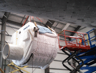 The SPACEHAB module is lifted into the air during the 'Go for Payload' event at the California Science Center, on October 9, 2014.