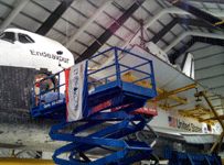 The SPACEHAB module is about to be placed inside Endeavour's cargo bay during the 'Go for Payload' event at the California Science Center, on October 9, 2014.