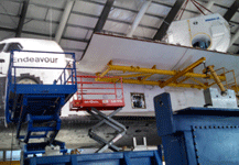 The SPACEHAB module is about to be placed inside Endeavour's cargo bay during the 'Go for Payload' event at the California Science Center, on October 9, 2014.