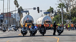 The LAPD detail prepares to escort Endeavour's two solid rocket motors down Figueroa Street to the California Science Center in Exposition Park...on October 11, 2023.