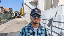 Posing with one of Endeavour's two solid rocket motors at the California Science Center in Exposition Park...on October 11, 2023.