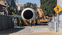 One of Endeavour's two solid rocket motors is parked near the construction site of the California Science Center's Samuel Oschin Air and Space Center...on October 11, 2023.