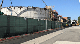 One of Endeavour's two solid rocket motors is parked near the construction site of the California Science Center's Samuel Oschin Air and Space Center...on October 11, 2023.