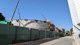 One of Endeavour's two solid rocket motors is parked near the construction site of the California Science Center's Samuel Oschin Air and Space Center...on October 11, 2023.