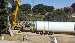 The first of Endeavour's two solid rocket motors is about to be lifted and placed onto a temporary workstand near the Rose Garden at Exposition Park in Los Angeles...on October 11, 2023.