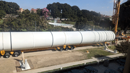 The first of Endeavour's two solid rocket motors is about to be lifted and placed onto a temporary workstand near the Rose Garden at Exposition Park in Los Angeles...on October 11, 2023.