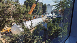 The first of Endeavour's two solid rocket motors is placed onto a temporary workstand near the Rose Garden at Exposition Park in Los Angeles...on October 11, 2023.