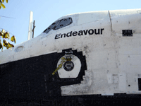 Space shuttle Endeavour resumes her trip through the streets of Los Angeles, on October 12, 2012.