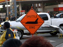 A custom-made traffic sign is displayed on a street for space shuttle Endeavour's parade, on October 12, 2012.