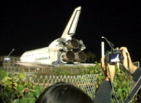Space shuttle Endeavour crosses over the 405 Freeway in Inglewood, on October 12, 2012.