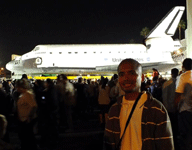 Posing with space shuttle Endeavour at the Baldwin Hills Crenshaw Plaza, on October 13, 2012.
