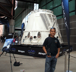 Posing with SpaceX's Dragon C1 capsule during Endeavour Fest at the California Science Center, on October 13, 2013.