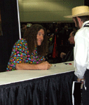 'Weird Al' Yankovic signs autographs at the Comikaze Expo in the Los Angeles Convention Center, on November 2, 2013.