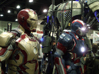 The Mark 45 and Iron Patriot armors from IRON MAN 3 on display at the Comikaze Expo in L.A., on November 2, 2013.