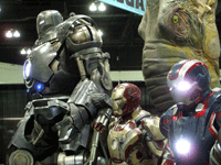 The Iron Monger, Mark 45 and Iron Patriot armors on display at the Comikaze Expo in L.A., on November 2, 2013.