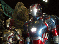 The Mark 45 and Iron Patriot armors from IRON MAN 3 on display at the Comikaze Expo in L.A., on November 2, 2013.