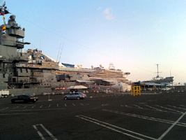 A cruise ship sails past the USS Iowa on its way out to sea, on November 4, 2013.