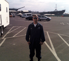 Posing in front of the USS Iowa at the Pacific Battleship Center in San Pedro, California, on November 4, 2013.