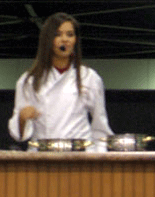 Whitney Miller conducts a cooking demo.