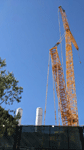 The twin solid rocket motors for Endeavour stand tall at the construction site for the future Samuel Oschin Air and Space Center in Los Angeles...on November 8, 2023.