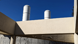 The twin solid rocket motors for Endeavour stand tall at the construction site for the future Samuel Oschin Air and Space Center in Los Angeles...on November 8, 2023.