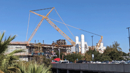 The twin solid rocket motors for Endeavour stand tall at the construction site for the future Samuel Oschin Air and Space Center in Los Angeles...on November 8, 2023.