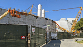 The twin solid rocket motors for Endeavour stand tall at the construction site for the future Samuel Oschin Air and Space Center in Los Angeles...on November 8, 2023.